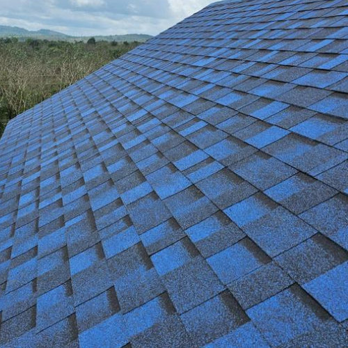 Stylish asphalt roofing shingles on a modern home